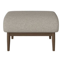 Light gray textured fabric ottoman with rounded corners and dark wooden legs. Neutral colors for versatile decor.