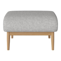 Light gray upholstered ottoman with a textured finish and natural wood legs. Ideal for modern decor.