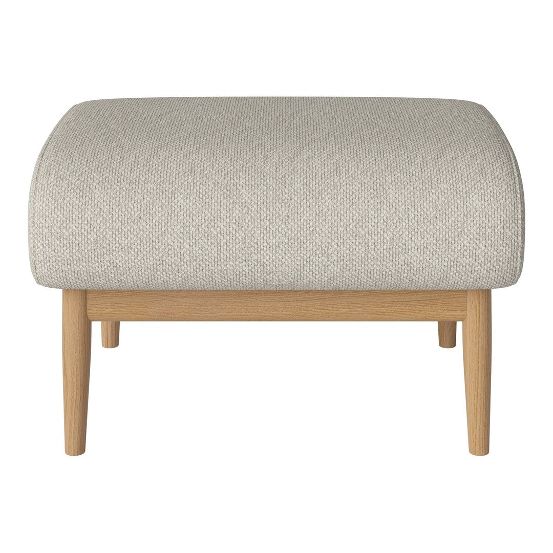 Light gray upholstered ottoman with a textured pattern and natural wood legs, creating a modern, minimalist aesthetic.
