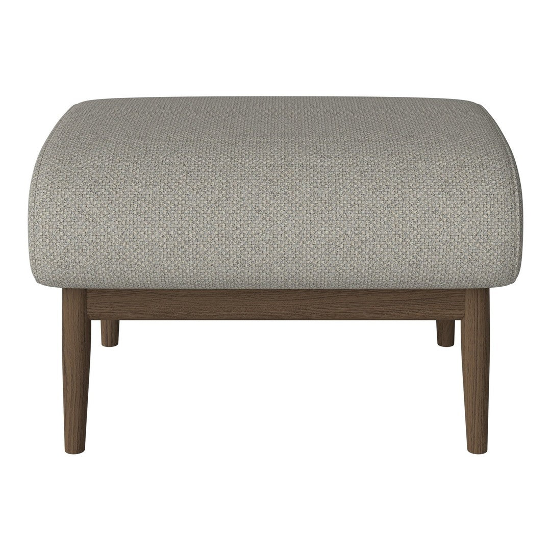 Light grey textured ottoman with a rounded top and wooden legs, perfect for modern decor.