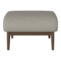 Light grey textured ottoman with a rounded top and wooden legs, perfect for modern decor.