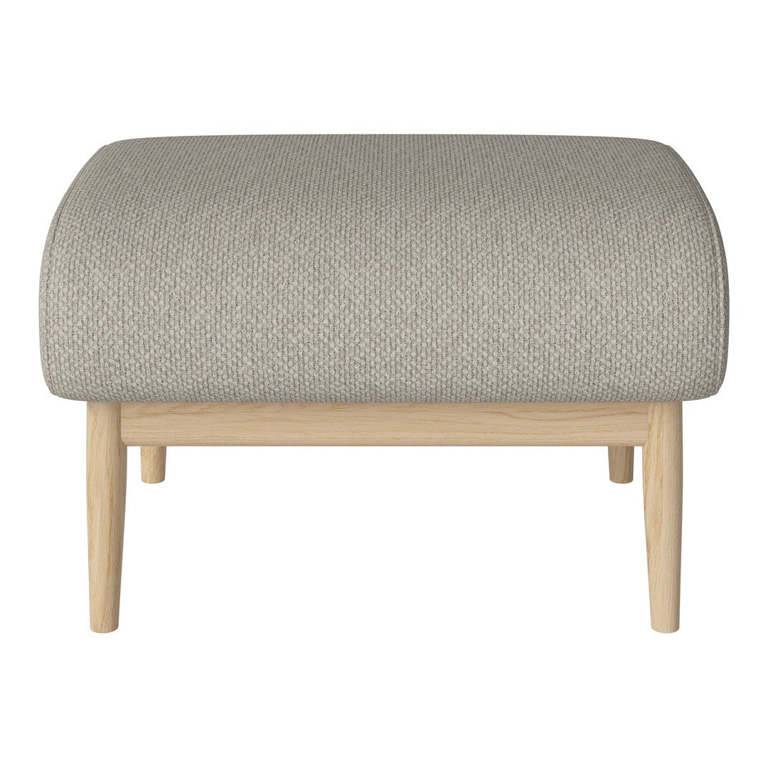 Gray upholstered ottoman with a textured pattern and light wood legs, adding modern elegance to any space.