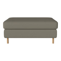 Gray upholstered ottoman with a textured pattern and light wooden legs. Stylish and modern accent for any space.