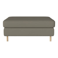 Gray upholstered ottoman with a textured pattern and light wooden legs. Stylish and versatile for any room.