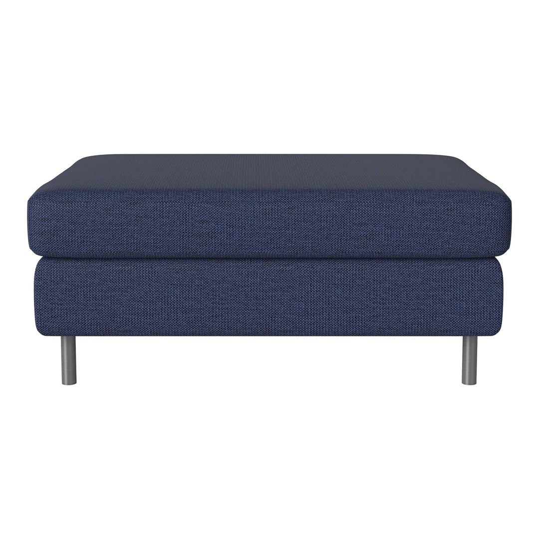 Navy blue upholstered ottoman with a textured pattern and sleek metal legs. Perfect for modern living spaces.