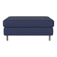 Navy blue upholstered ottoman with a textured finish and sleek metallic legs. Perfect for any modern living space.