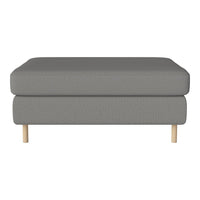 Gray upholstered ottoman with a textured pattern and light wooden legs. Modern and versatile design for any space.