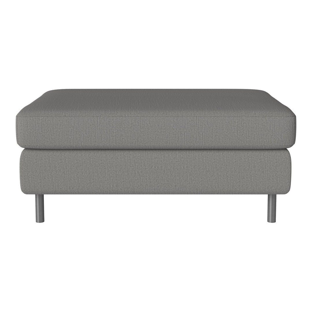Gray upholstered ottoman with a textured pattern and sleek metal legs, perfect for modern decor.