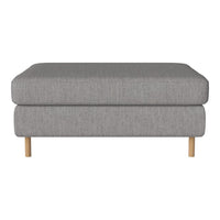 Gray upholstered ottoman with a subtle texture and wooden legs, perfect for modern living spaces.