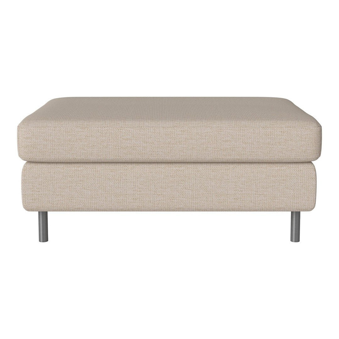 Beige fabric ottoman with a smooth texture and minimalist design, supported by silver metal legs.
