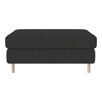 Dark gray ottoman with textured fabric and wooden legs, ideal for modern decor.