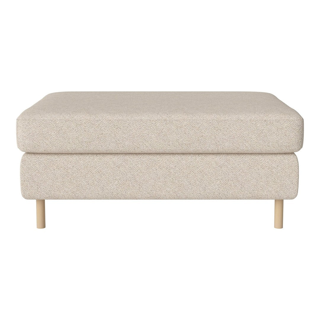 Beige upholstered ottoman with a soft texture and simple design, complemented by natural wood legs.