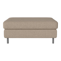 Beige upholstered ottoman with a smooth fabric texture and sleek metal legs, perfect for modern living spaces.