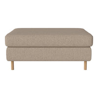 Beige upholstered ottoman with a solid pattern and natural wood legs for a minimalist aesthetic.