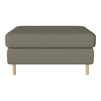 Gray upholstered ottoman with a textured pattern and light wood legs. Minimalist design for modern interiors.