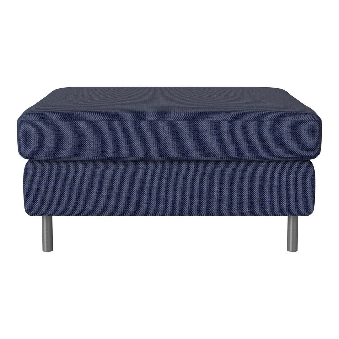 Navy blue upholstered ottoman with a smooth texture and sleek silver legs. Perfect for modern decor.