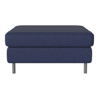 Navy blue upholstered ottoman with a smooth texture and sleek silver legs. Perfect for modern decor.