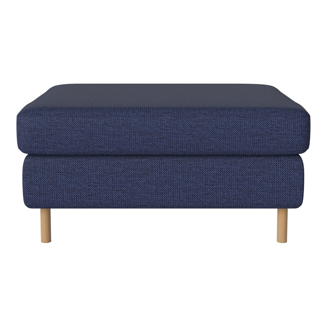 Navy blue upholstered ottoman with a textured pattern and light wood legs. Ideal for modern decor.