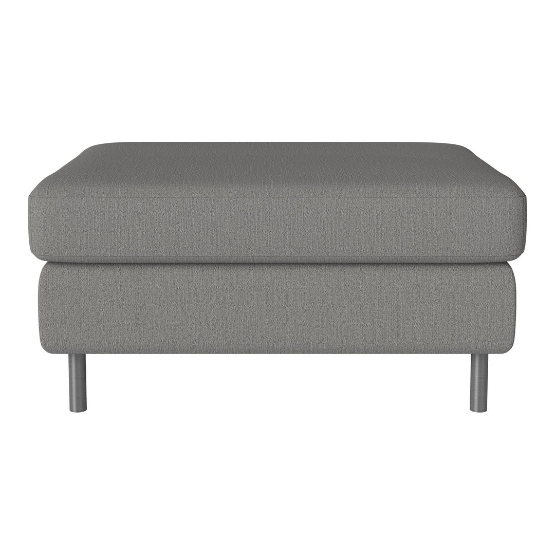 Gray upholstered ottoman with a textured pattern and sleek metal legs. Perfect for modern decor.