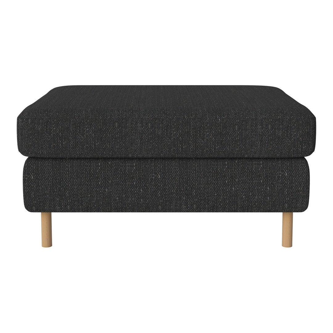Black fabric ottoman with textured pattern and light wooden legs, offering a modern and versatile look.