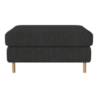 Black fabric ottoman with textured pattern and light wooden legs, offering a modern and versatile look.