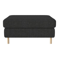 Black textured ottoman with natural wood legs, perfect for modern decor.