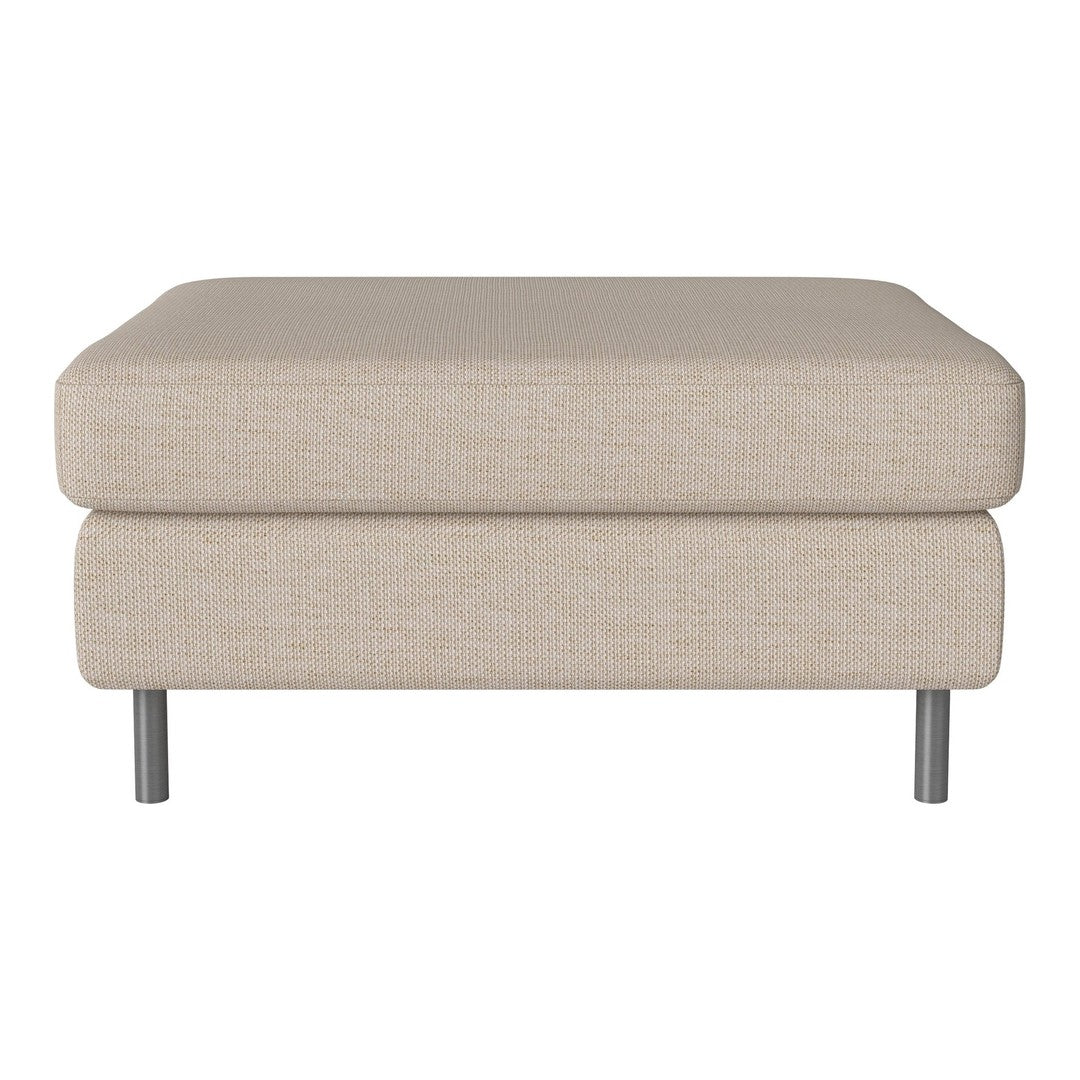 Beige upholstered ottoman with a smooth texture and sleek metal legs, perfect for modern decor.