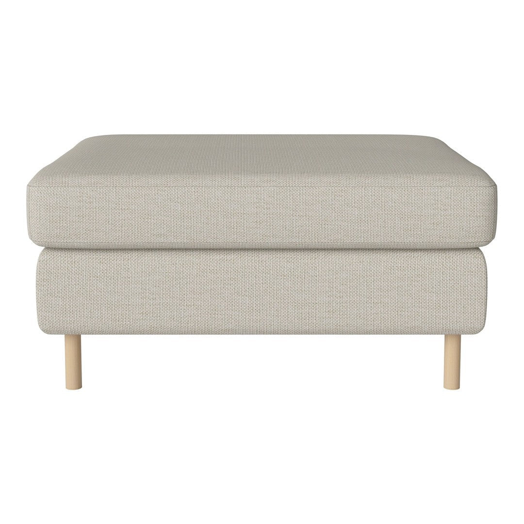 Light beige ottoman with a textured fabric and natural wood legs, perfect for modern living spaces.