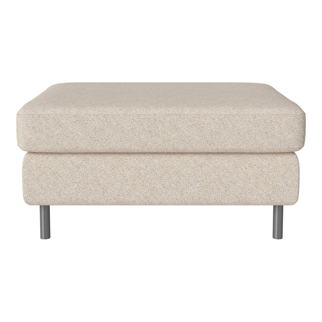 Light beige ottoman with a textured fabric and sleek silver legs, perfect for modern living spaces.