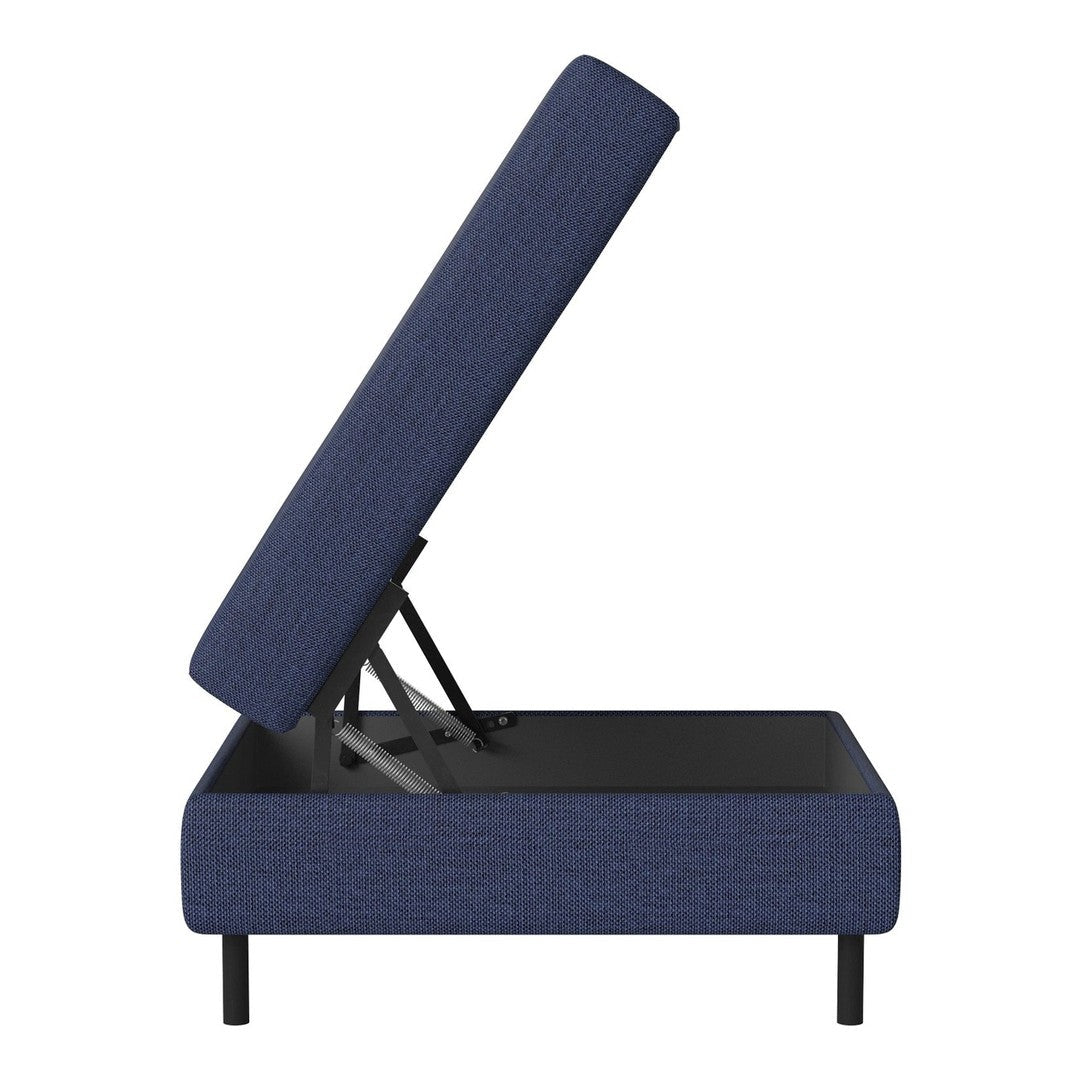 Navy blue upholstered storage ottoman with a textured fabric and sleek black legs, featuring an open lift-top design.