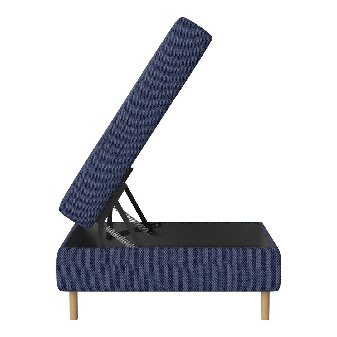 Navy blue upholstered storage ottoman with a textured surface and light wooden legs. Perfect for modern decor.