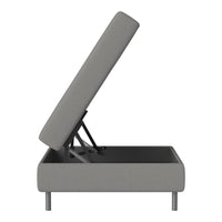 Gray upholstered storage bed with a clean, minimalist design and subtle textured pattern.