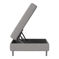Gray storage ottoman with a textured fabric and sleek metal legs, featuring a modern and minimalist design.