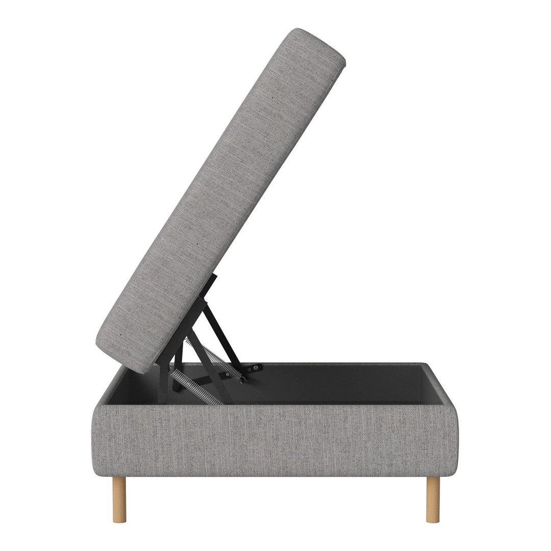 Gray upholstered storage ottoman with minimalist design and natural wooden legs. Functional lift-top lid.