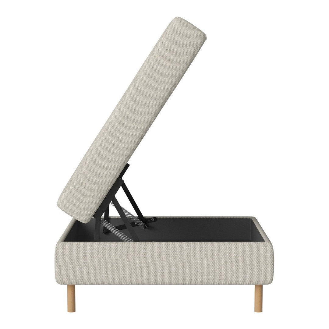 Light gray upholstered storage ottoman with simple design and natural wood legs, featuring a solid black interior.