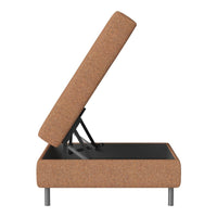 Brown upholstered storage ottoman with a textured fabric and minimalist metal legs. Ideal for modern decor.