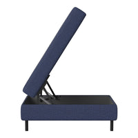 Navy blue upholstered storage bed with a textured pattern, featuring a sleek black metal frame.