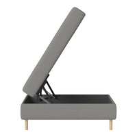 Grey storage bed frame with a minimalist design and wooden legs, featuring a clean, modern aesthetic.