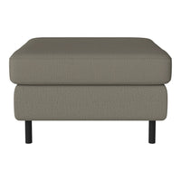 Taupe upholstered ottoman with a smooth fabric texture and solid black legs, featuring a minimalist design.