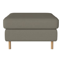 Gray textured ottoman with light wood legs, perfect for modern living spaces.