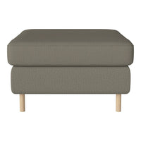 Gray upholstered ottoman with a textured pattern and natural wood legs, perfect for modern decor.