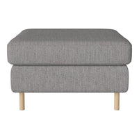 Gray upholstered ottoman with textured fabric and light wooden legs. Simple, modern design perfect for any decor.