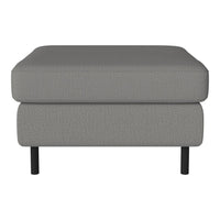 Gray upholstered ottoman with a textured fabric and sleek black legs, perfect for modern decor.