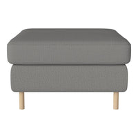 Gray textured ottoman with a minimalist design and light wood legs, ideal for modern decor.