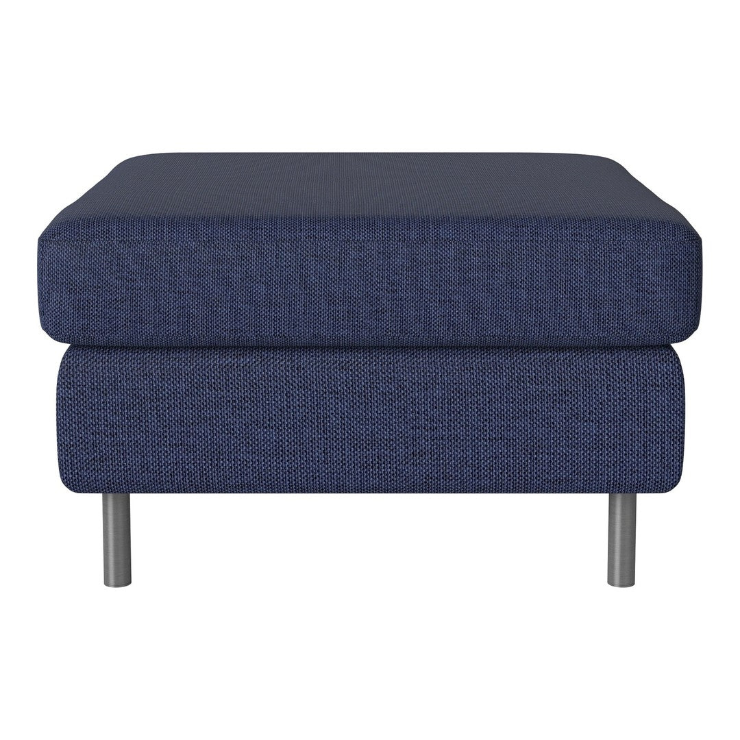 Navy blue upholstered ottoman with a textured pattern and sleek silver legs, perfect for modern decor.