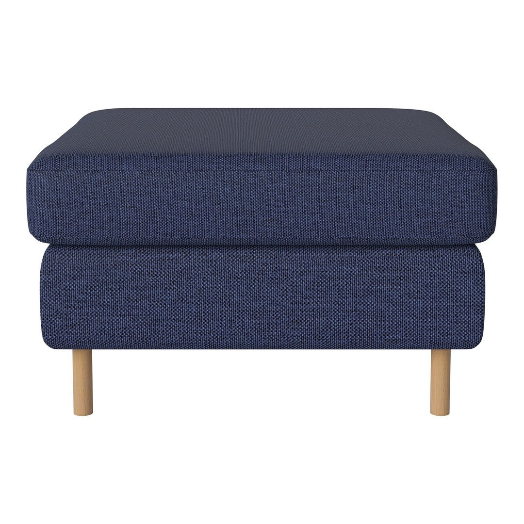 Navy blue upholstered ottoman with a textured pattern and light wooden legs. Perfect for modern living spaces.