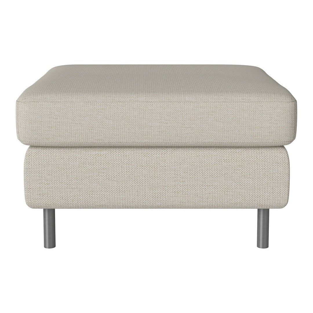 Light beige fabric ottoman with a smooth texture and modern silver legs, perfect for any contemporary living space.