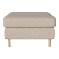 Beige upholstered ottoman with textured fabric and light wood legs, perfect for modern interiors.