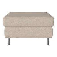Beige upholstered ottoman with a textured pattern and silver metal legs. Ideal for modern living spaces.