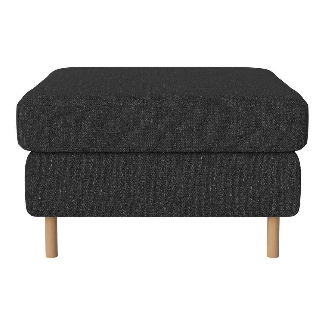 Black textured ottoman with a minimalist design and light wood legs. Ideal for modern living spaces.